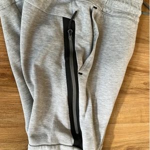 Nike tech fleece joggers in grey size s